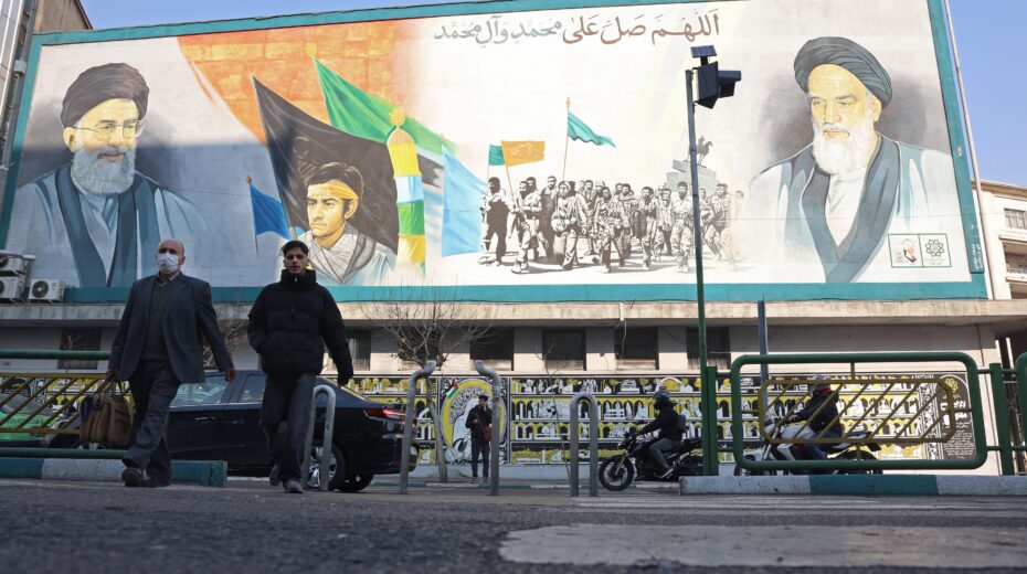 Passersby walk past a mural depicting Iran's Supreme Leader Ayatollah Ali Khamenei and revolutionary leader Ruhollah Khomeini in Tehran. While the regime demonstrates its ideological unity, a new wave of anti-government protests is shaking the country. EPA/ABEDIN TAHERKENAREH