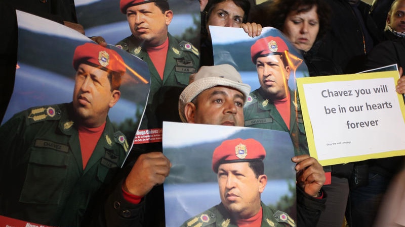 Palestinians hold portraits of late Venezuelan President Hugo Chavez during a rally in front of Venezuelan Embassy in Ramallah on March 6, 2013. Chavez died a day earlier from complications related to cancer at a military hospital in Caracas, Venezuela. Photo by Issam Rimawi/Flash90