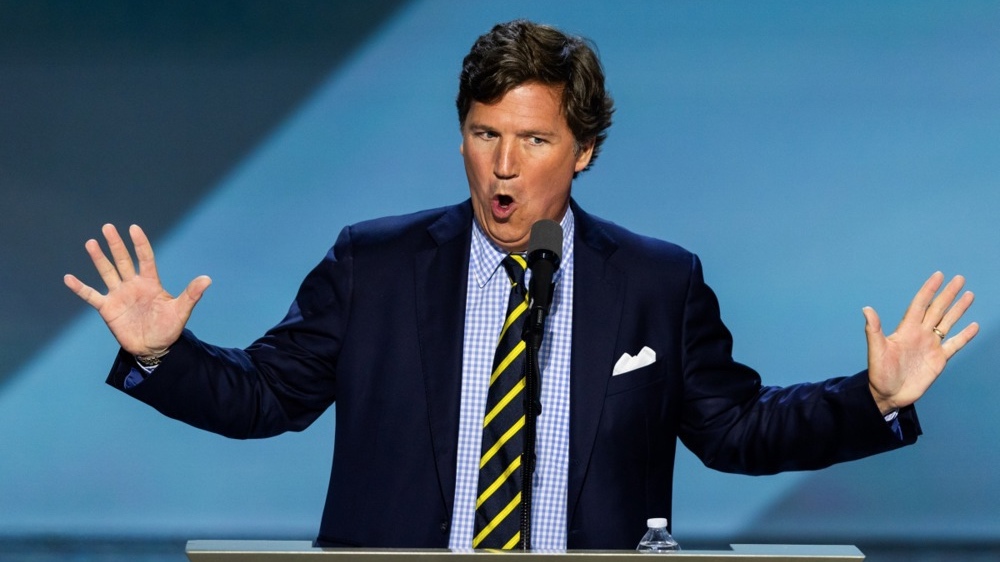 American media personality Tucker Carlson. Photo by EPA/JIM LO SCALZO