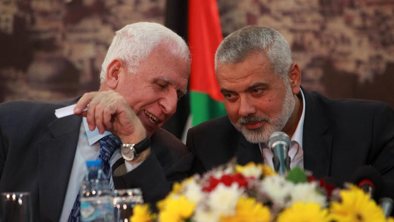 PLO Secretary-General Azzam al-Ahmed (left) with slain Hamas leader Ismail Haniyeh in Gaza City in 2014. Photo by Abed Rahim Khatib/Flash90