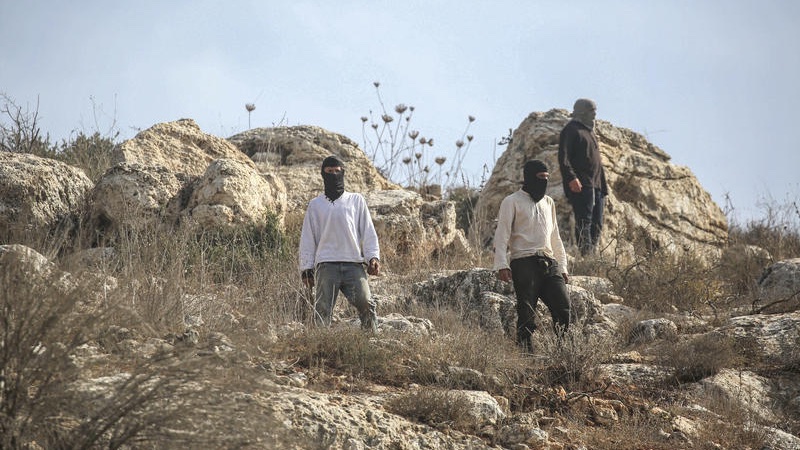 Masked Jewish youth clash with Palestinians near Nablus (biblical Shechem) in central Samaria. Photo by Nasser Ishtayeh/Flash90
