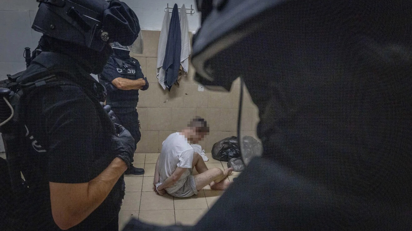 Israel Prison Service guards operate in a special wing for Israelis accused of spying for Iran, in Damon Prison on Mount Carmel, July 1, 2025. Photo by Chaim Goldberg/Flash90.