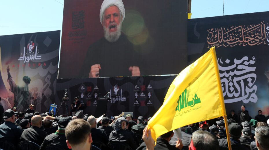 Hezbollah supporters watch a video message from their Secretary General, Sheikh Naim Qassem, during Ashura commemorations in Beirut, July 6, 2025. Photo: EPA/WAEL HAMZEH