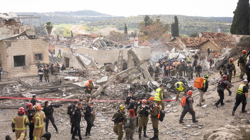 A scene of utter destruction in a residential neighborhood hit by an Iranian missile in the central Israel city of Beit Shemesh. Photo by Yonatan Sindel/Flash90