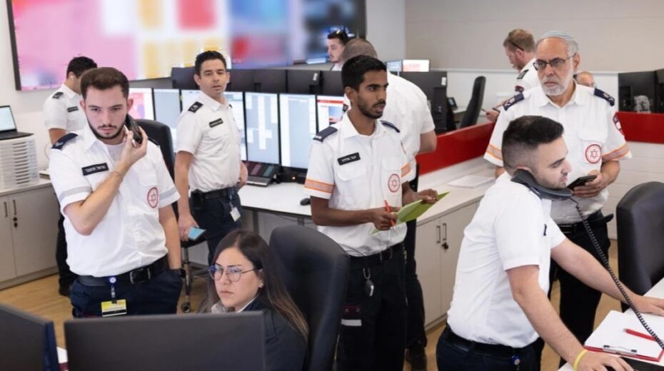 The dispatch room at the Magen David Adom national operations center in Ramla fields routine emergency calls and reports of injuries from Iranian missile attacks, March 18, 2026. Credit: MDA.