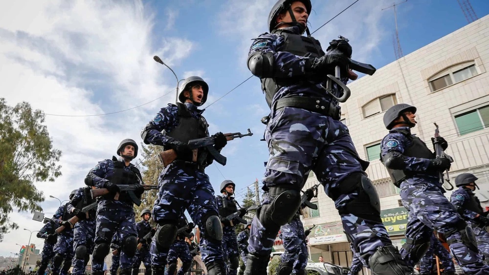 Palestinian Authority security personnel parade in the Judea city of Hebron, Nov. 14, 2017. Photo by Wisam Hashlamoun/Flash90.