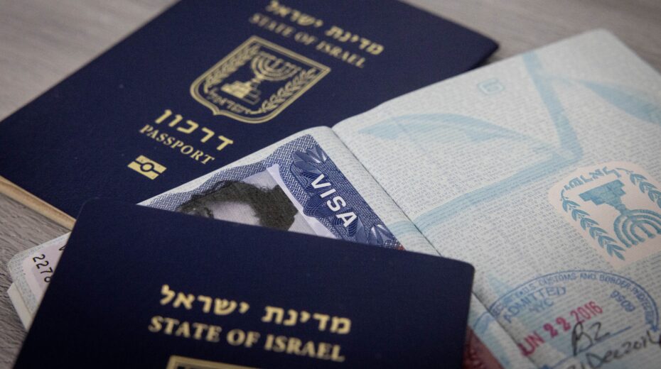 Illustration of passports and a travel visa. Sept. 23, 2023. Photo by Chaim Goldberg/Flash90.