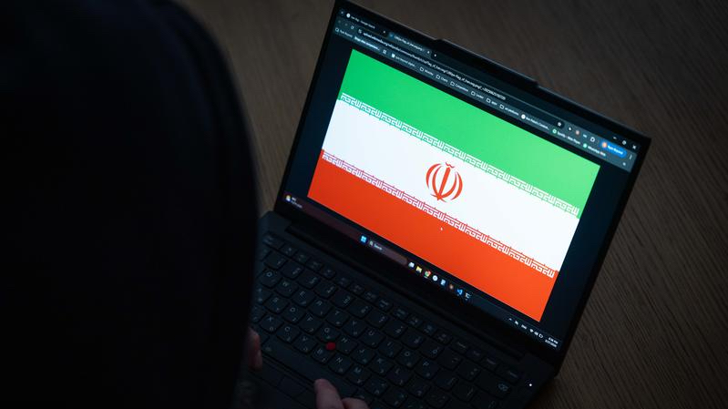 An illustrative photo of a laptop displaying the Iranian flag, representing Iran in a digital or cyber context, March 27, 2026. Photo by Nati Shohat/Flash90