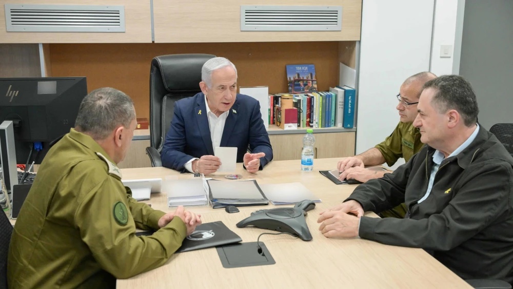 Israeli Prime Minister Benjamin Netanyahu holds a security assessment at the Kirya military headquarters in Tel Aviv with Defense Minister Israel Katz and senior security officials, March 18, 2023. Photo: Maayan Toaf/GPO.