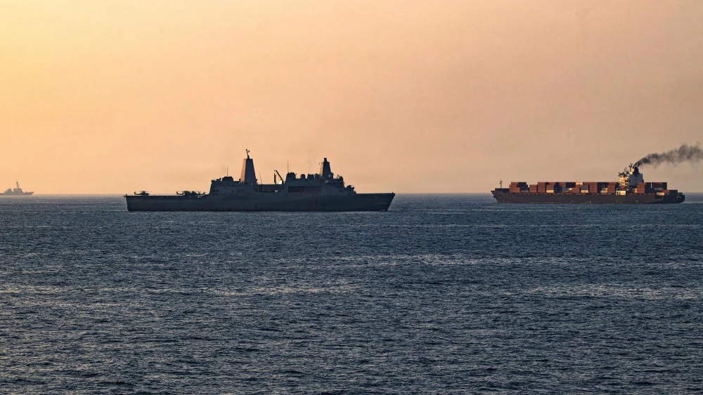 U.S. forces patrol the Arabian Sea near the Iran-linked merchant ship Touska in the U.S. Central Command area of responsibility, April 20, 2026. The vessel attempted to violate a U.S. naval blockade April 19, 2026. Credit: U.S. Navy.