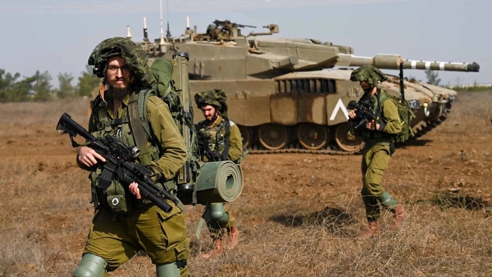 Israel Defense Forces reserve infantry and Merkava tank soldiers train in the Golan Heights on Oct. 23, 2023. Photo by Michael Giladi/Flash90.