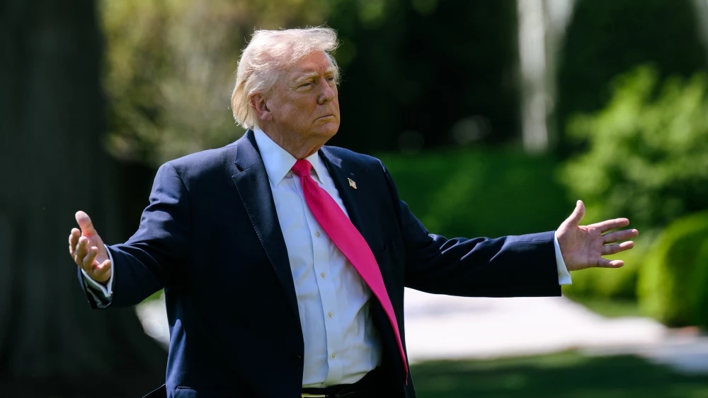 U.S. President Donald Trump speaks with members of the media before boarding Marine One on the South Lawn of the White House, April 16, 2026. Credit: Molly Riley/White House.