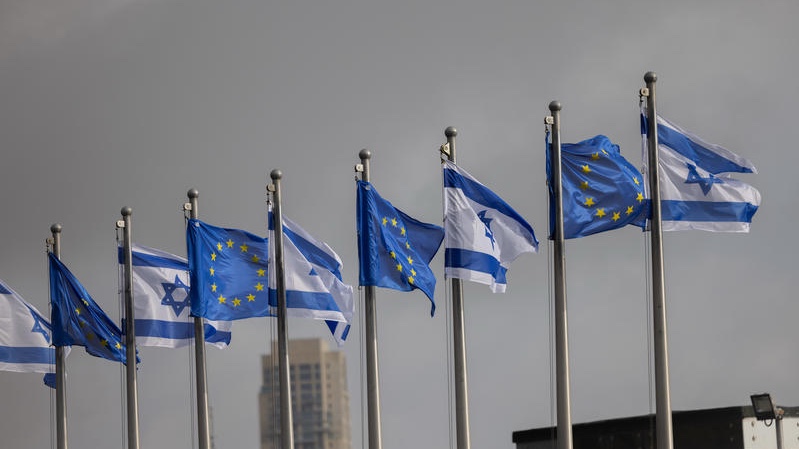 Israeli and European Union flags fly outside the Knesset in Jerusalem during a visit by senior EU officials. Photo by Chaim Goldberg/Flash90