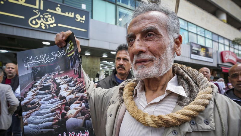 Palestinians protest against a law passed by the Knesset imposing the death penalty for terrorists who murder Israeli civilians. Photo by Nasser Ishtayeh/Flash90