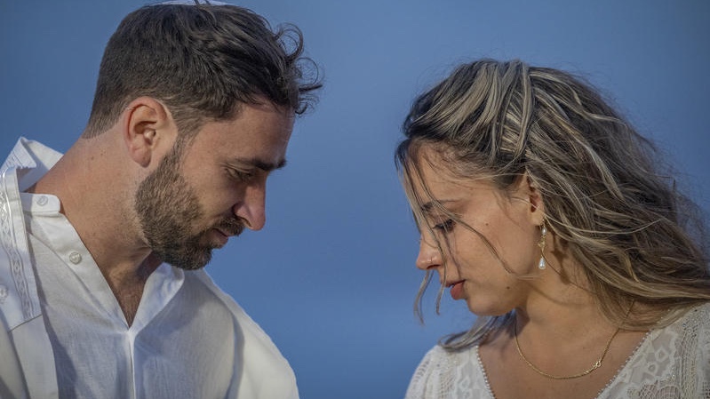 Avia Slotki stands with her groom Micha Goldenberg during their wedding near Beit Shemesh, May 6, 2026. Slotki is the widow of Yishai Slotki, who was killed alongside his brother Noam on October 7 in Kibbutz Alumim. Photo by Chaim Goldberg/Flash90