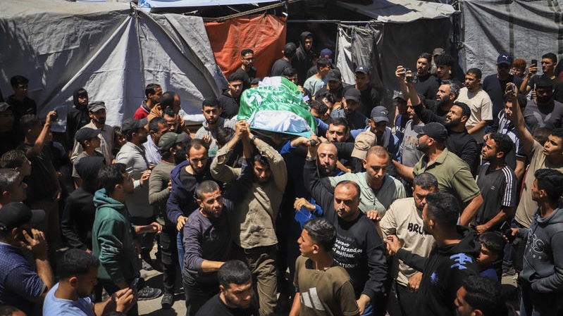 Palestinians participate in the funeral procession of Izz al-Din al-Haddad, a senior commander in the Qassam Brigades, the military wing of Hamas, who was killed in an Israeli airstrike in Gaza City, May 16, 2026. Photo by Khalil Kahlout/Flash90