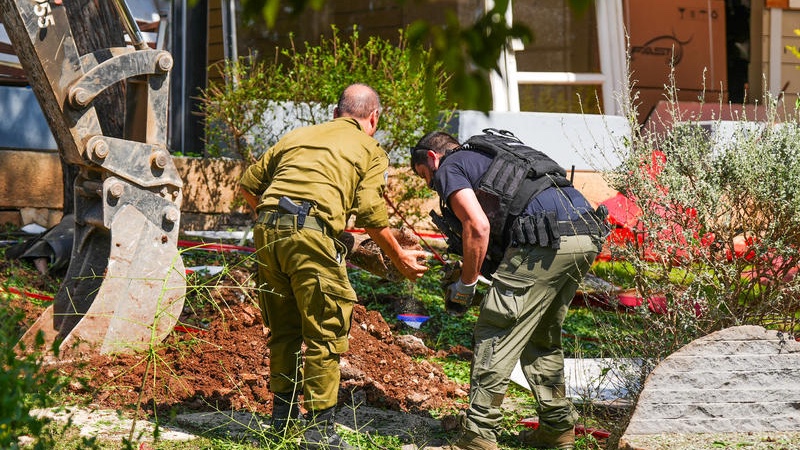 Israeli security forces and civilians at the scene where a missile fired from Lebanon toward Israel overnight caused damage in the northern Israeli city of Kiryat Shmona, May 30, 2026. Photo by Ayal Margolin/Flash90