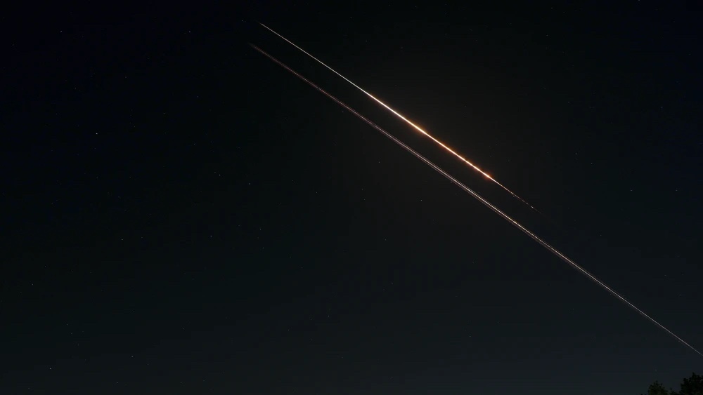 Israeli air defenses intercept incoming rockets launched from Lebanon at northern Israel during the war with Iran and Hezbollah, March 24, 2026. Photo by Ayal Margolin/Flash90.