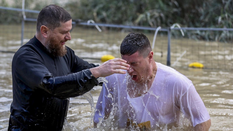 Christians take part in a traditional baptism ceremony at Qasr el Yahud, the site where Jesus is believed to have been baptized, near the town of Jericho. Photo by Flash90