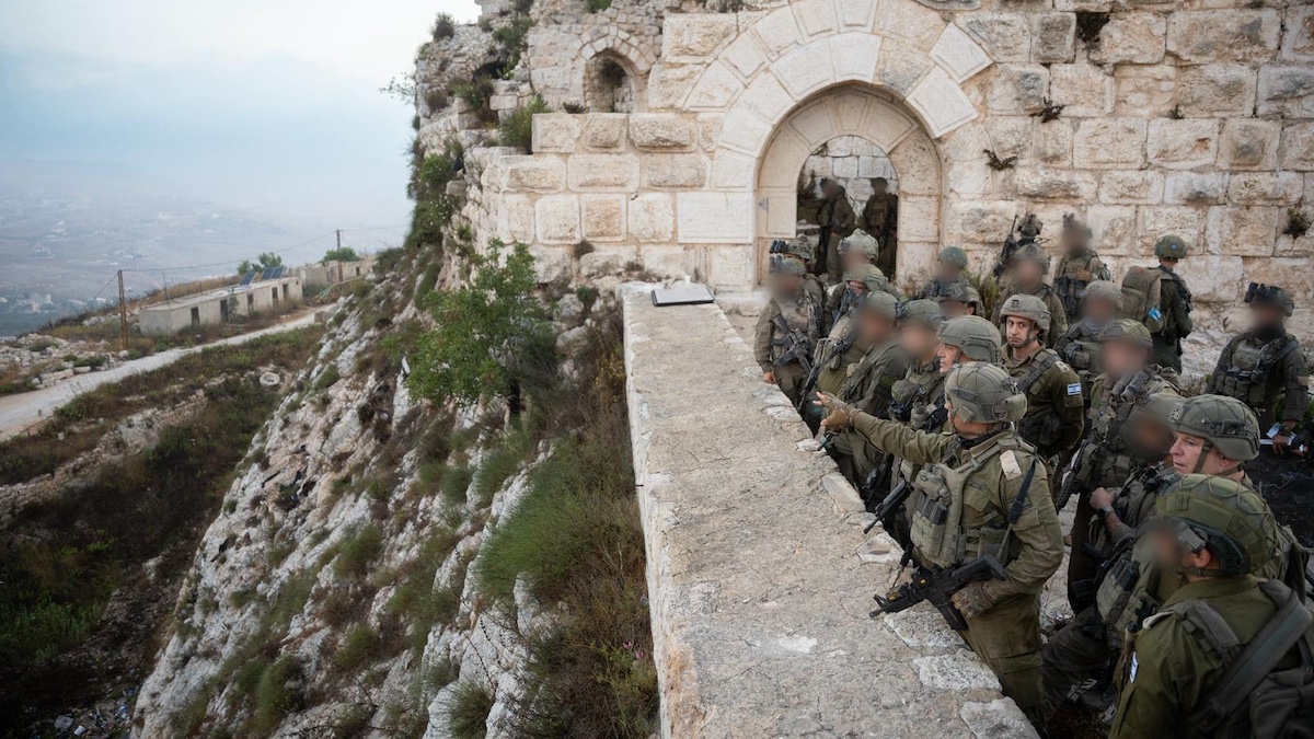 IDF Chief of Staff Eyal Zamir and his troops look out over the surrounding terrain from the gates of Beaufort Castle in southern Lebanon. Photo: IDF Spokesman