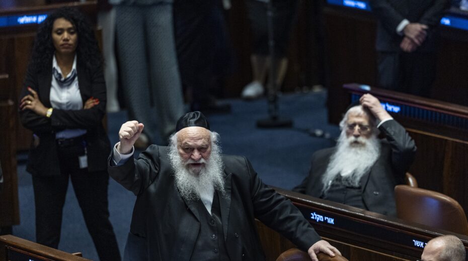 MK Yitzhak Goldknopf, government ministers and members of Knesset attend a plenum session and a vote on a bill to freeze arrests of Haredi draft evaders in the Knesset, July 14, 2026. Photo by Chaim Goldberg/Flash90.