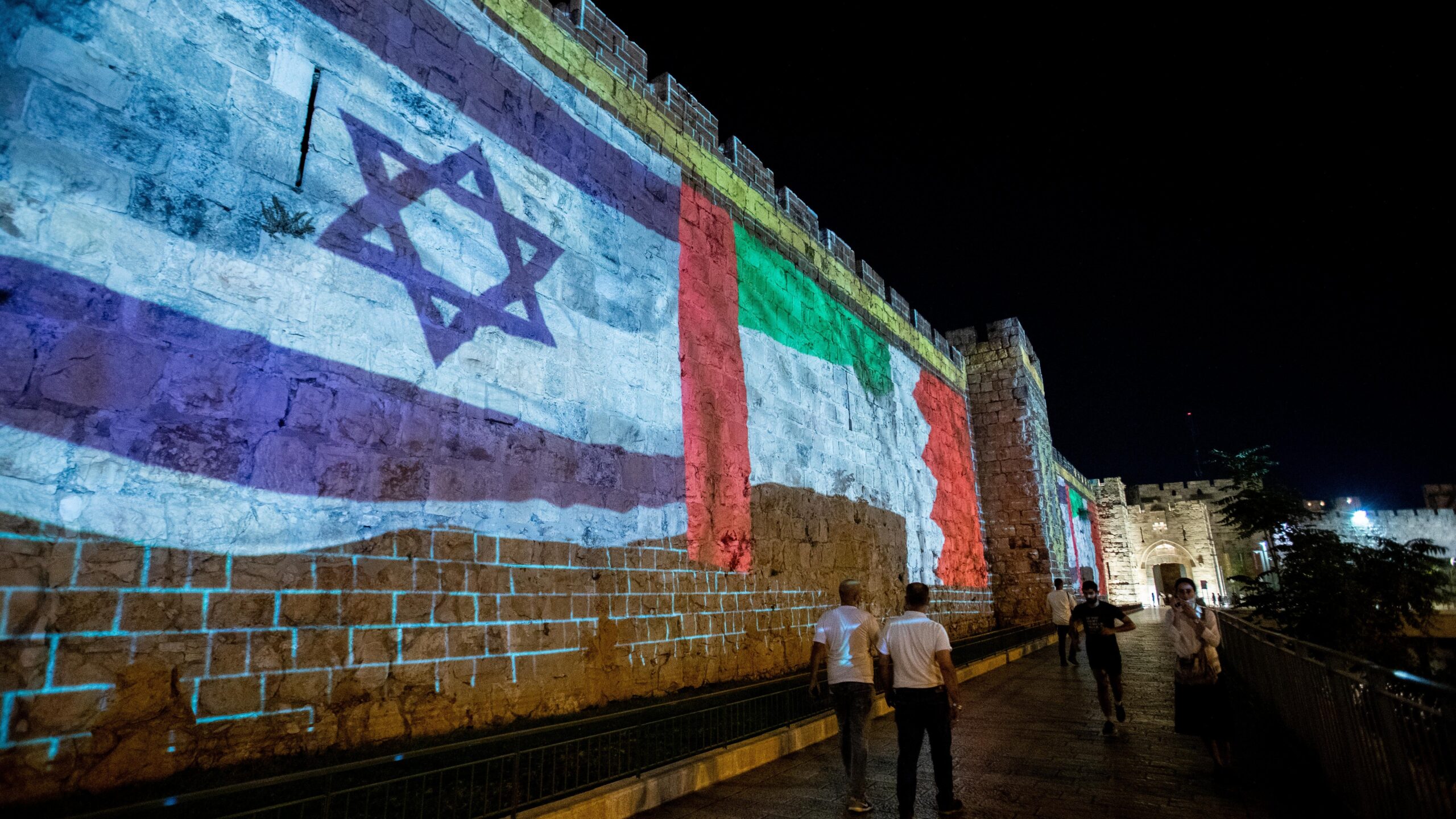 The flags of Israel, the United Arab Emirates and Bahrain are projected onto the walls of Jerusalem's Old City, September 15, 2020. Photo: Yonatan Sindel/Flash90