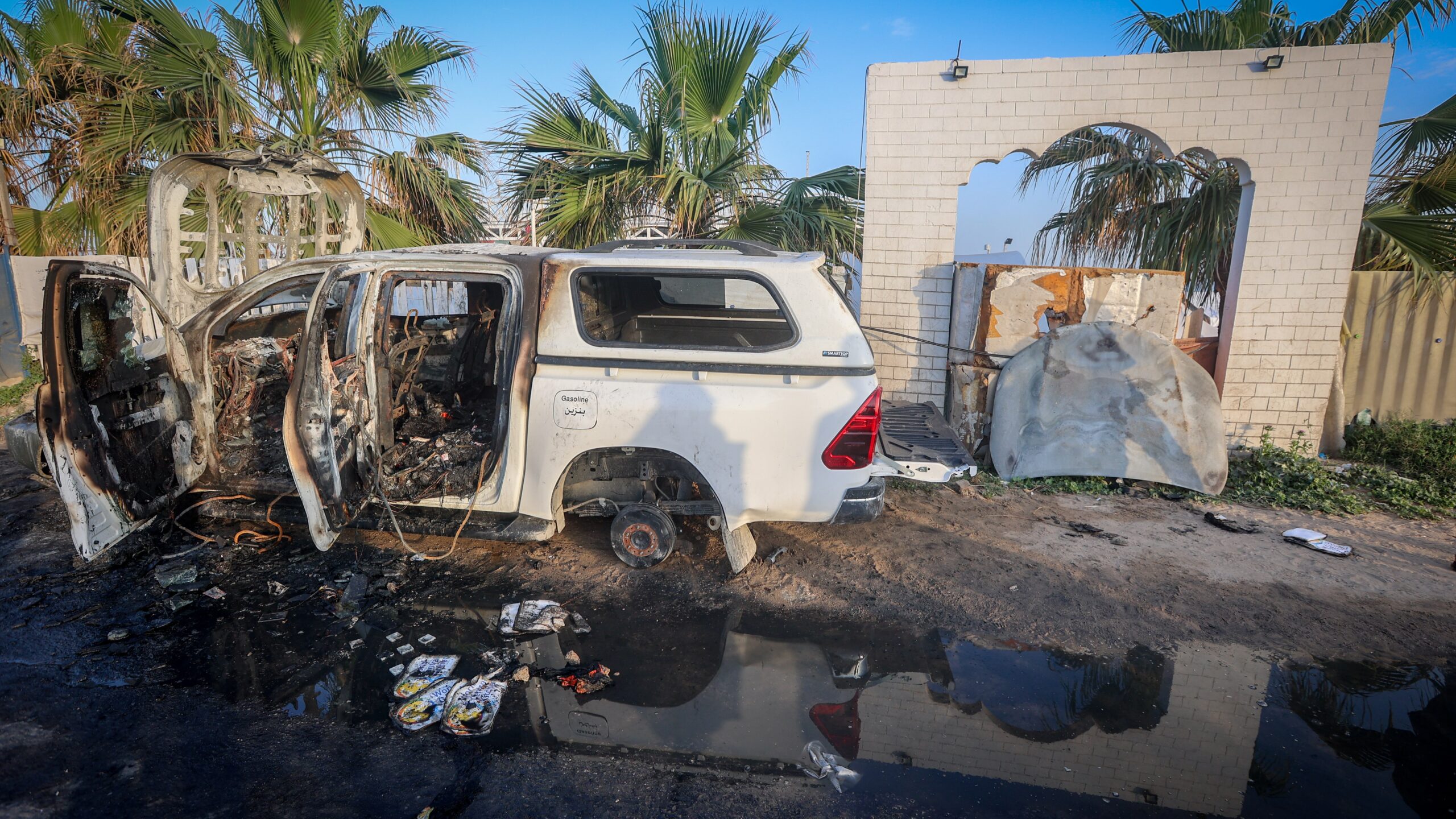 A vehicle belonging to the aid organization World Central Kitchen hit in an Israeli airstrike in Deir al-Balah in the Gaza Strip, April 2, 2024. Photo: Atia Mohammed/Flash90