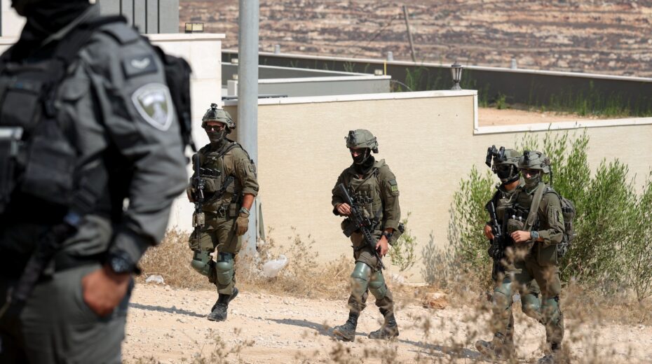 IDF soldiers near the house at the center of the fighting in Qusra, Samaria, August 14, 2026. Photo: Flash90