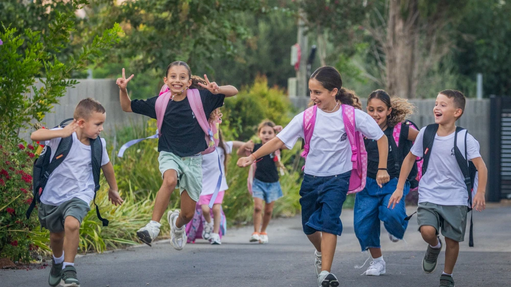Israeli children enjoying the end of their summer vacation pose in Moshav Yashresh, Aug. 27, 2026. Classes will begin on Sept. 1. Photo by Yossi Aloni/Flash90.