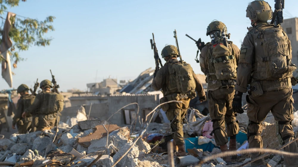 Israeli soldiers operate amid rubble in the Gaza Strip. Credit: IDF.