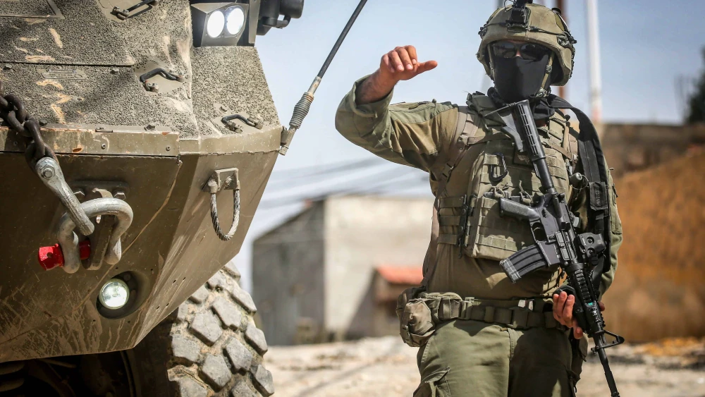 Israeli soldiers operate with an Eitan armored personnel carrier in the Samaria city of Jenin, March 4, 2025. Photo by Nasser Ishtayeh/Flash90.