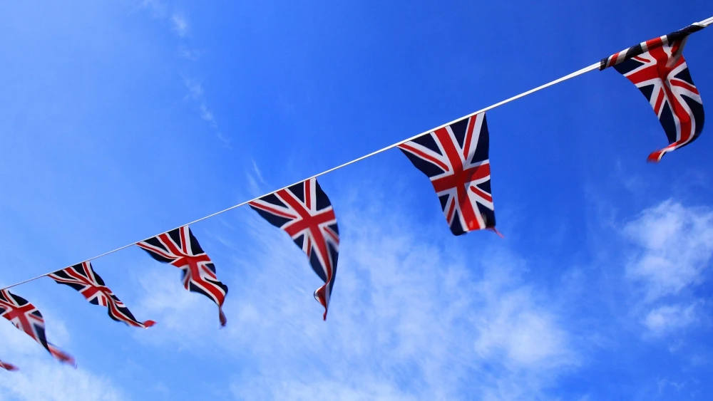 British flags hung on a line. Credit: PublicDomainPictures/Pixabay.