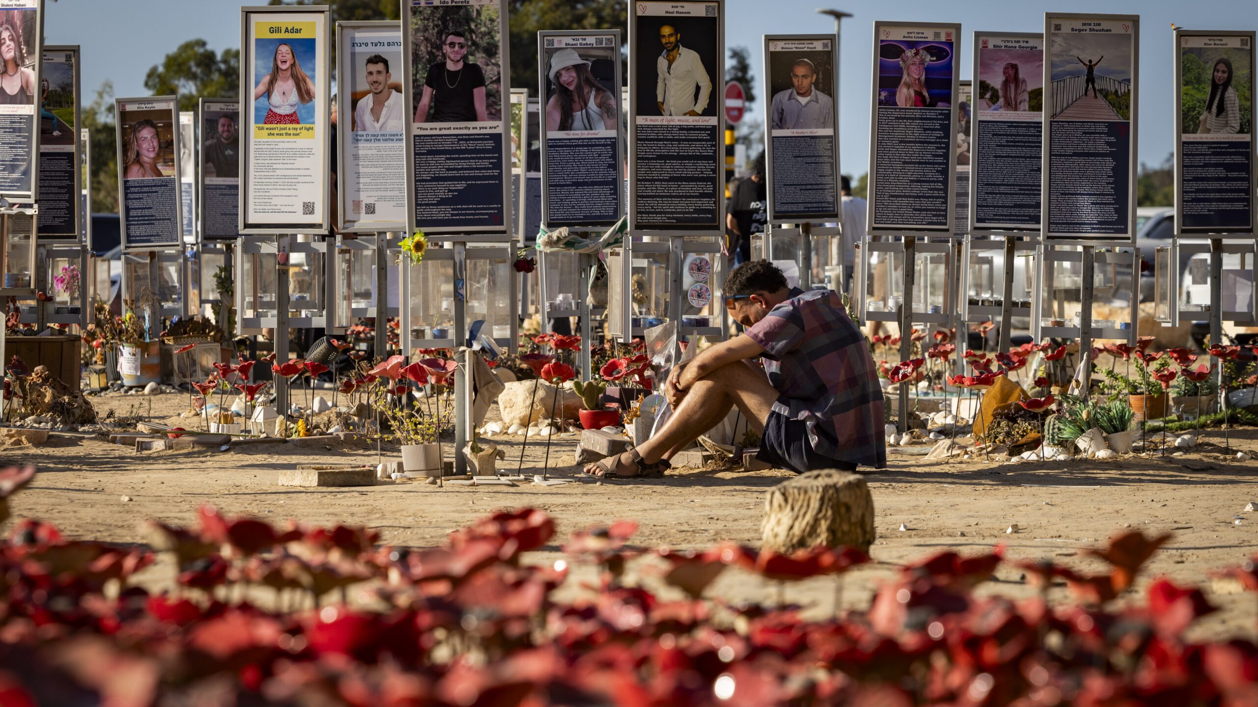 A man mourns at the memorial for the victims of the Nova music festival near Kibbutz Re'im, three years after the Hamas massacre of October 7. October 7, 2026. Photo: Chaim Goldberg/Flash90.