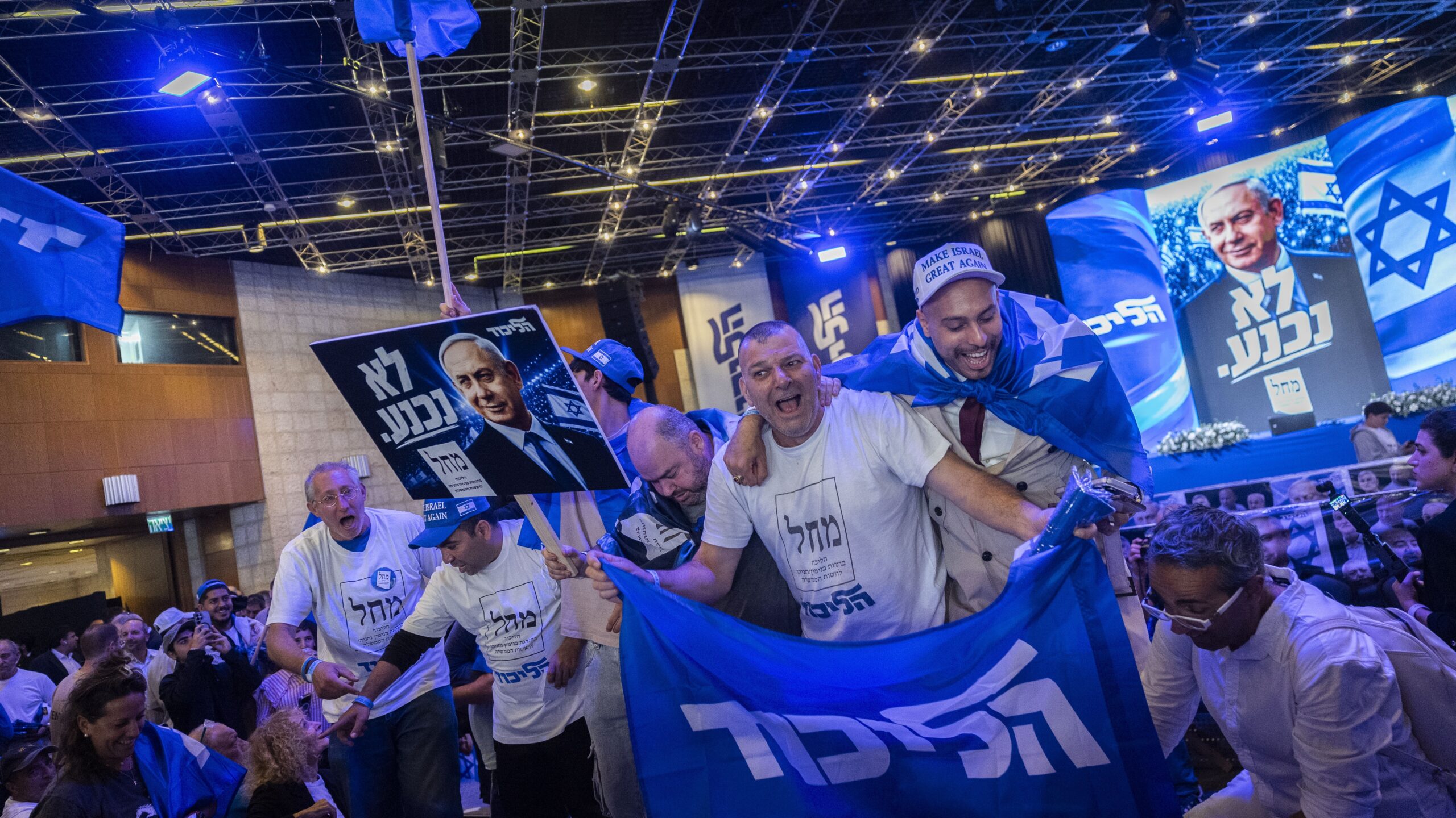 Likud supporters celebrate at the party's election headquarters in Jerusalem following the announcement of the first election polls on October 28, 2026. Photo: Chaim Goldberg/Flash90